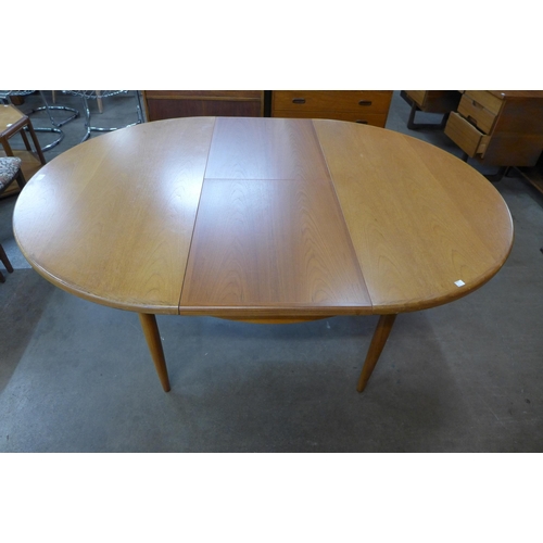 77 - A G-Plan Fresco teak extending dining table