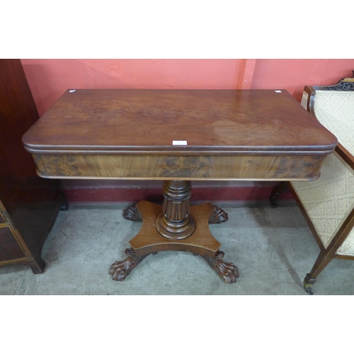 9 - A George IV mahogany D-shaped fold over tea table