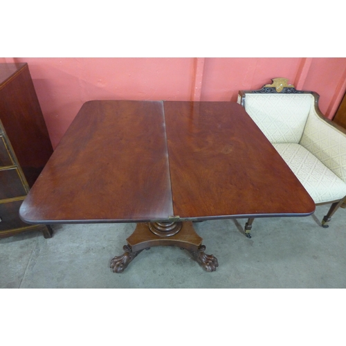 9 - A George IV mahogany D-shaped fold over tea table