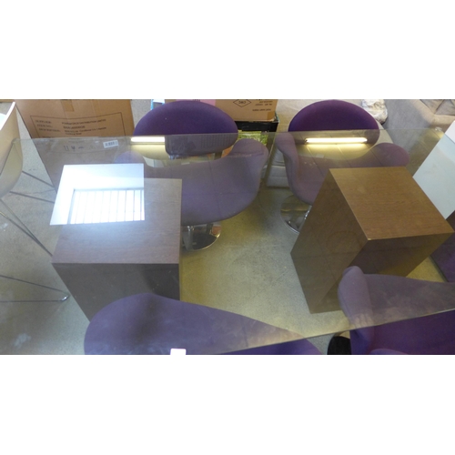 1550 - A glass topped double pedestal dining table and four purple dining chairs (sun bleached chairs)