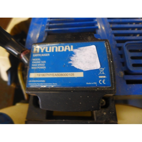 2104 - Hyundai petrol driven earth auger drilling head, - W