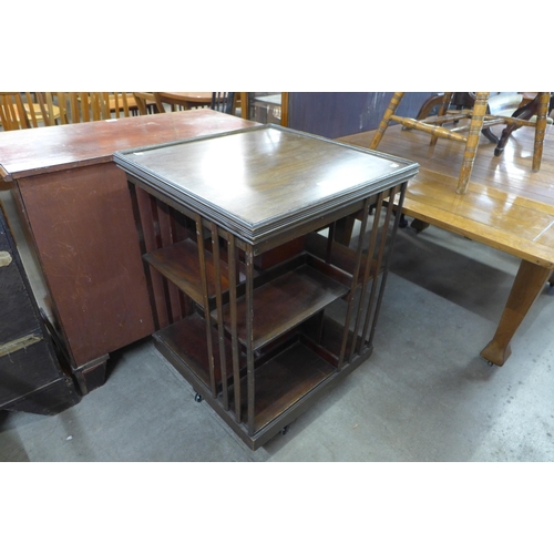 168 - An Edward VII mahogany revolving bookcase