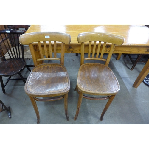 193 - A pair of beech bentwood chairs