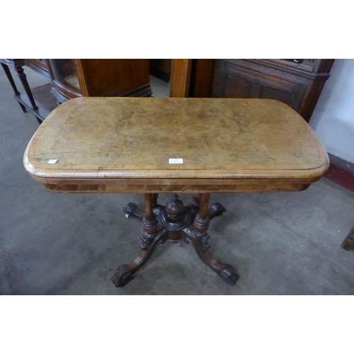 116 - A Victorian inlaid burr walnut fold over games table