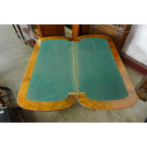 116 - A Victorian inlaid burr walnut fold over games table