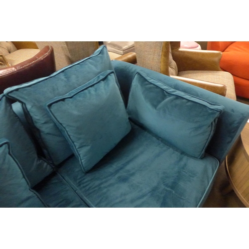 1382 - A turquoise velvet two seater sofa