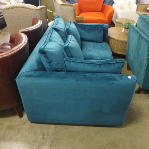 1382 - A turquoise velvet two seater sofa