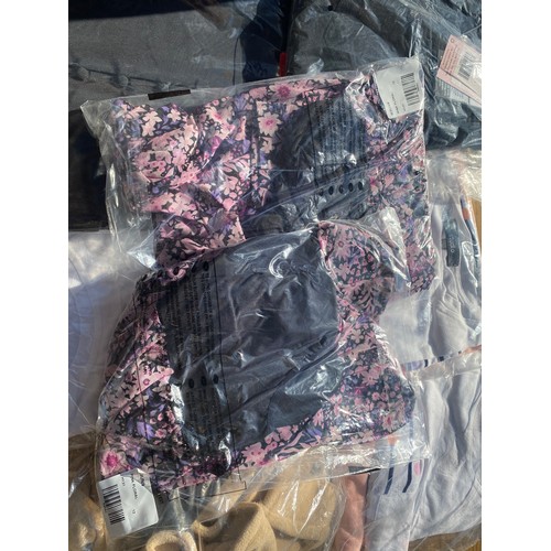 2057 - Box of various unused, wrapped clothing