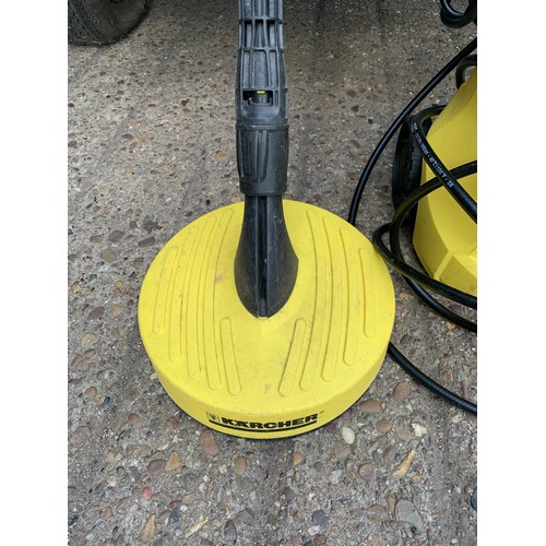 2073 - Karcher jetwash with two attachments and floor scrubber