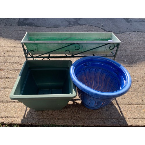 2289 - 2 large plastic planters with trough planter on stand