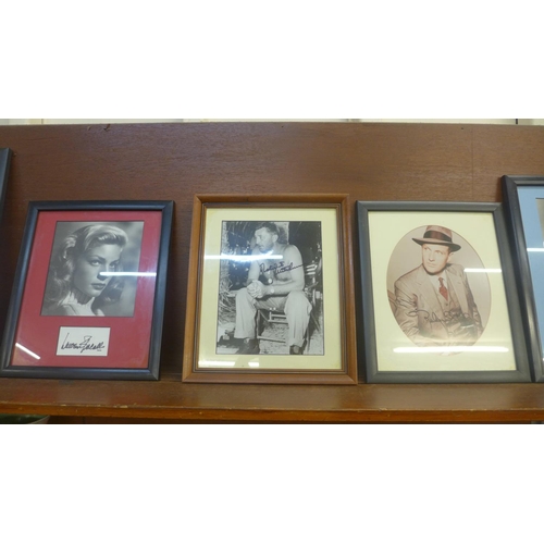 603 - A collection of framed celebrity autographs comprising Lauren Bacall, John Mills, Robert Mitcham, Ro... 