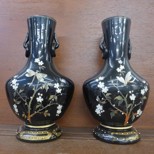 604 - A pair of Japanese style glass vases decorated with birds and insects, a/f, some paint rubbed, 28cm