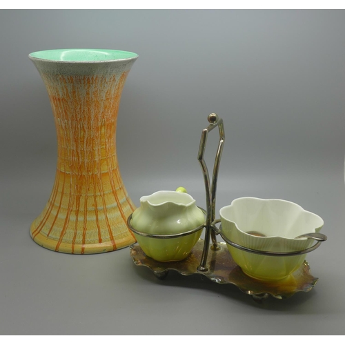 654 - A Shelley milk jug and sugar bowl in an EPNS cruet stand and a Shelley dripware vase, 20.5cm