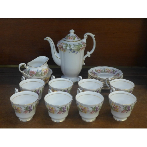 684 - A Paragon Country Lane coffee set, six saucers, eight cups, coffee pot, cream jug and sugar bowl