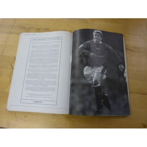 691 - Manchester United; a Player by Player book containing approximately 140 signatures from former playe... 