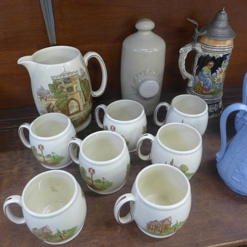 699 - A collection of pottery including, Kirkham Pottery large water jug, seven Coaching Inns mugs, a stei... 