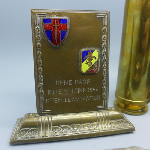 707 - Military items; shell cases, ammunition pouches, two Sten team match awards plaque and dish and a ca... 