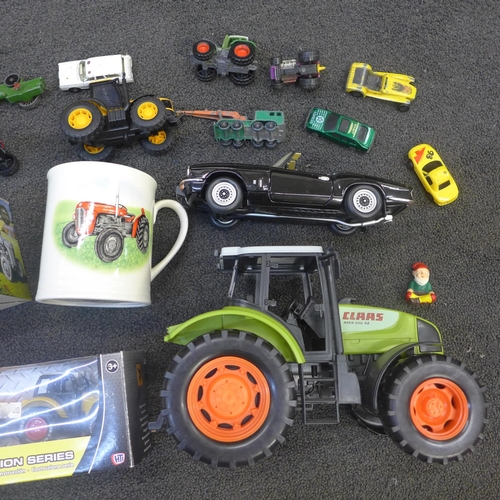 739 - Model vehicles including a Britains Elite tractor, model JCB, model cars and two mugs