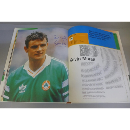 748 - Football:- three World Cup related books containing signatures from former players including Sol Cam... 