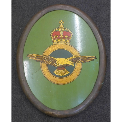 770 - A bronze framed tin-plate plaque with the Royal Air Force insignia, 70cm