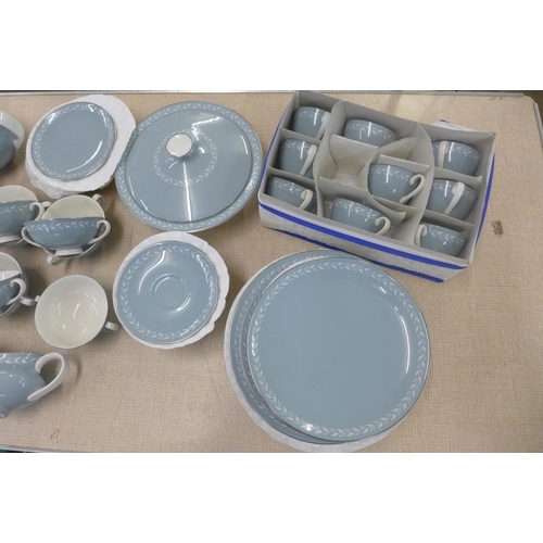 782 - A Royal Doulton Aegean dinner service including dinner plates, soup bowls, cups, tea pot, cream and ... 