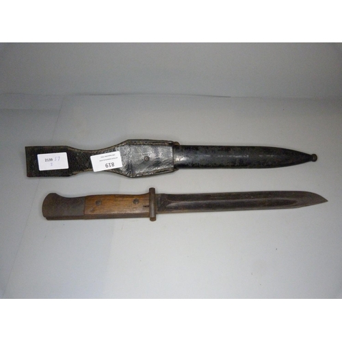 819 - A WWII Seitengewehr 84/98 bayonet with metal scabbard and leather frog, the blade marked 42asw and 2... 