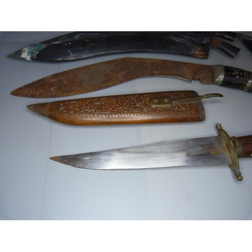 822 - Two Kukri and one dagger, Kukri blades a/f, rusty