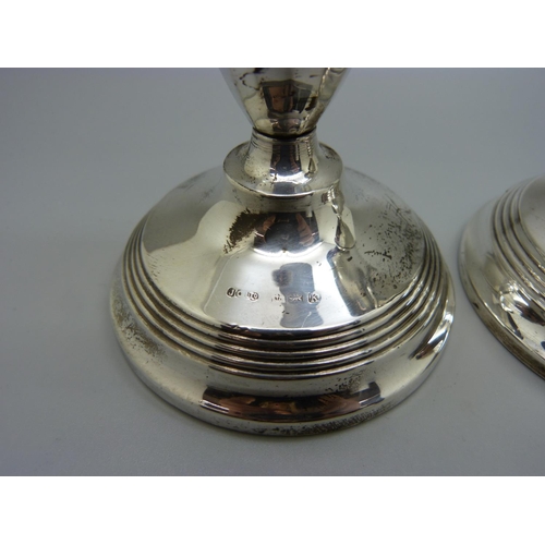 831 - A pair of silver candlesticks, Birmingham 1934, 13.5cm