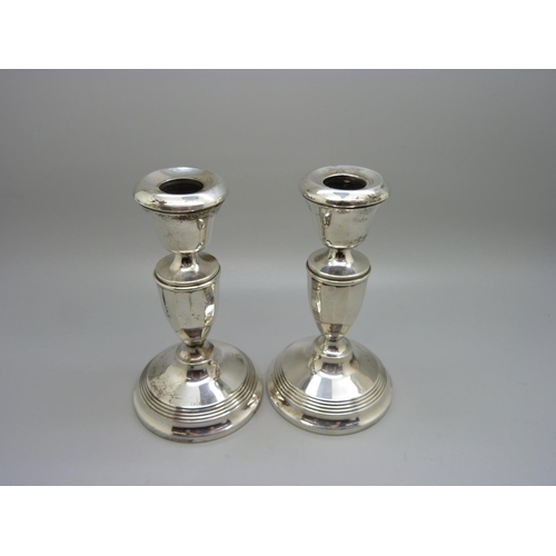 831 - A pair of silver candlesticks, Birmingham 1934, 13.5cm