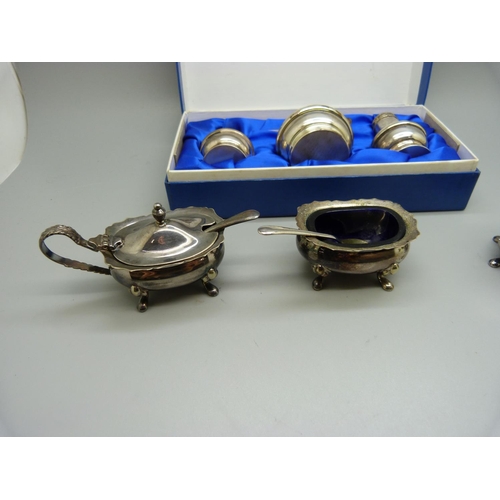 848 - A silver condiment set, 56g, boxed and a plated condiment set