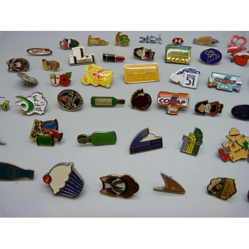 855 - A collection of pin badges