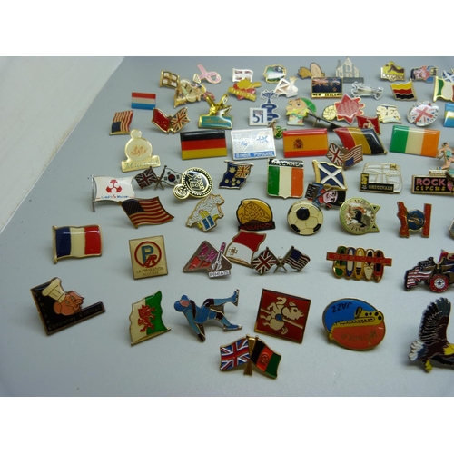 856 - A collection of pin badges