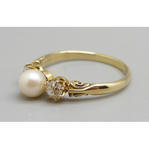 917 - An 18ct gold two stone diamond ring with pearl centre stone, P, 2.5g, circa 0.5ct diamond weight