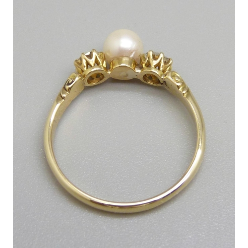 917 - An 18ct gold two stone diamond ring with pearl centre stone, P, 2.5g, circa 0.5ct diamond weight