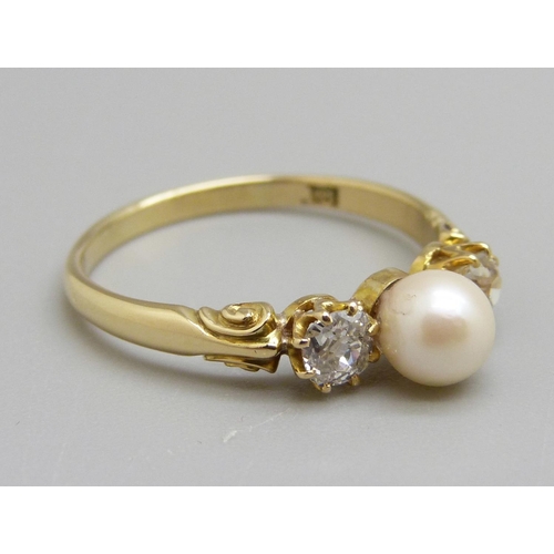 917 - An 18ct gold two stone diamond ring with pearl centre stone, P, 2.5g, circa 0.5ct diamond weight