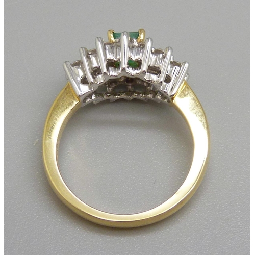 918 - An 18ct gold emerald and diamond cluster ring, M, 6.6g, fourteen brilliant cut diamonds, two baguett... 