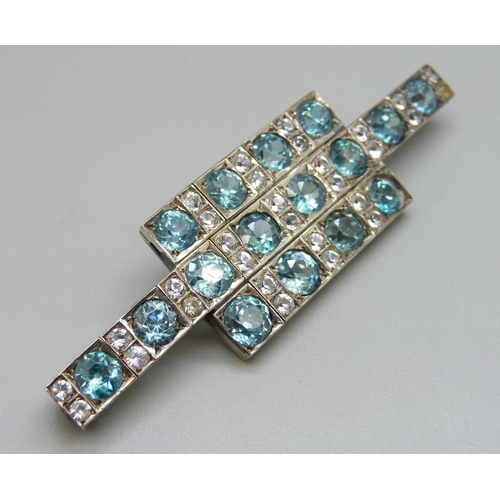 919 - An Art Deco style brooch, thirty white sapphires plus sixteen blue stones, (possibly zircon), 8cm, s... 