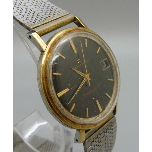 941 - An Eterna-Matic Centernaire '61' wristwatch, black dial with gold baton markers, lacking crown