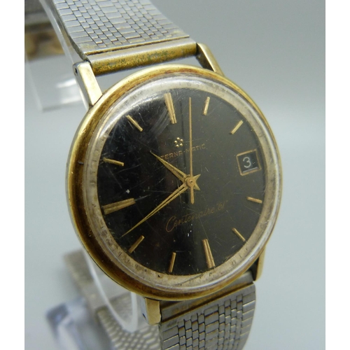 941 - An Eterna-Matic Centernaire '61' wristwatch, black dial with gold baton markers, lacking crown