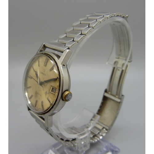 945 - An Omega Geneve wristwatch, replacement crown