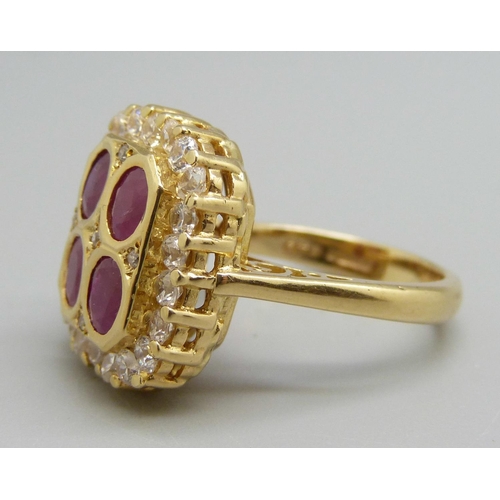 964 - An 18ct gold, ruby and white stone cluster ring, M, 9.5g, Birmingham 2001, 15mm x 18mm