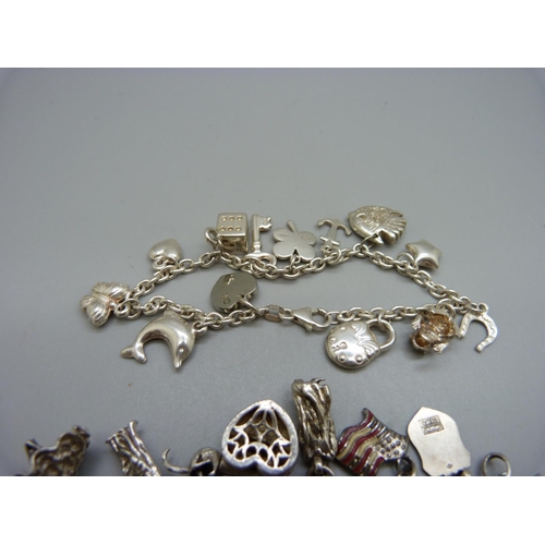 990 - Two silver charm bracelets, 71g