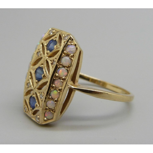 995 - An Art Deco style 9ct gold ring set with sapphires, opals and diamonds, 4.4g, W, 13mm x 20mm