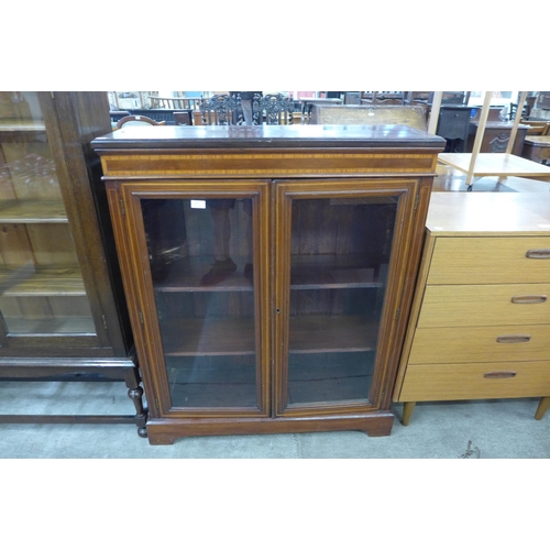 104 - An Edward VII inlaid mahogany bookcase