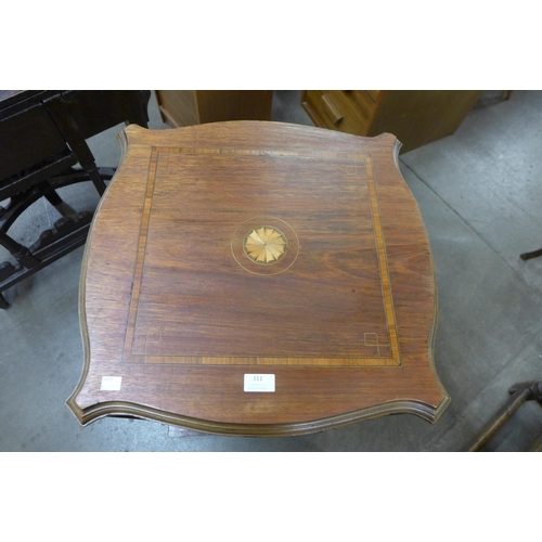 111 - An Edward VII inlaid mahogany revolving bookcase