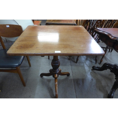 115 - A Victorian mahogany rectangular tilt top tripod table