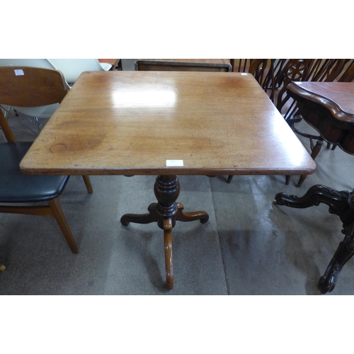 115 - A Victorian mahogany rectangular tilt top tripod table