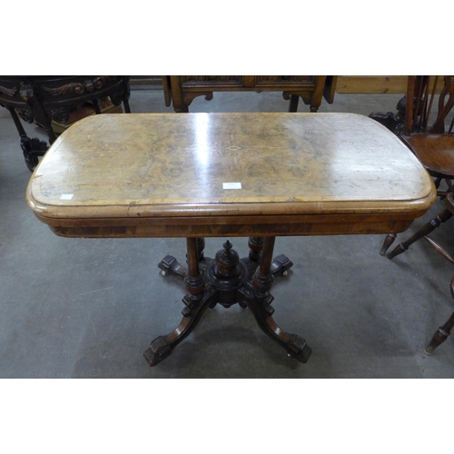 116 - A Victorian inlaid burr walnut fold over games table