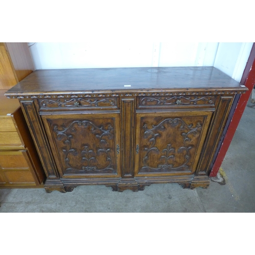 117 - An Italian Baroque style hardwood dresser