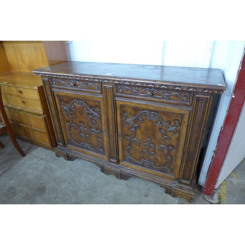 117 - An Italian Baroque style hardwood dresser